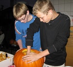 10/28/2008 - Mason and Josh carving pumpkins flown in from America