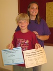 6/15/2010 - Isaac and Ms. Hills his teacher  He received the upper elementary character award
